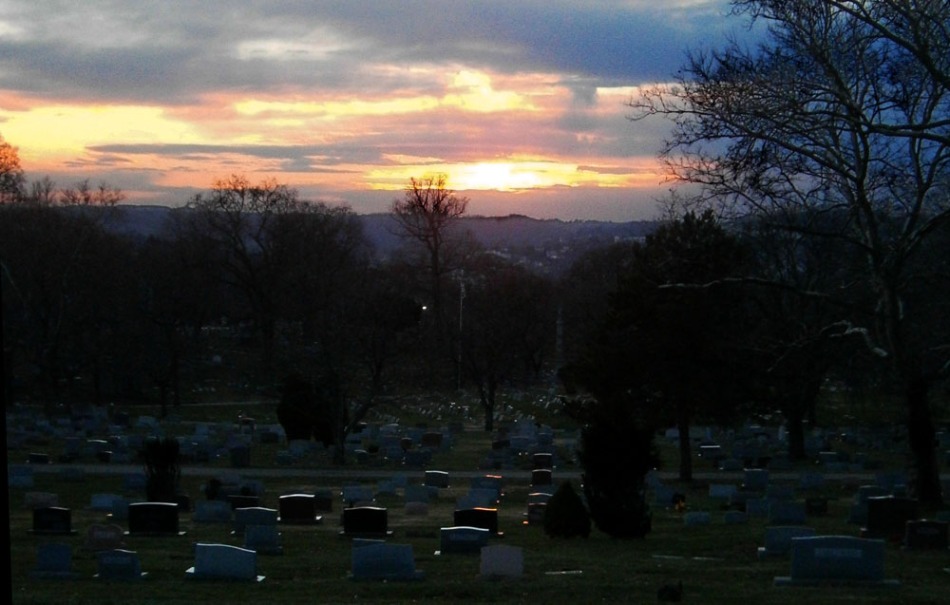 photo of sunset over cemetery